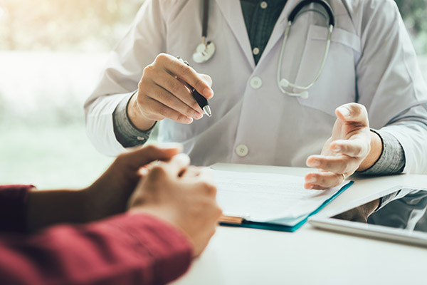 Doctor talking to the patient about menopause and treatment in future. functional bowel disorder treatment, treatment for iIBS orange ca, treatment for functional bowel disorder orange ca